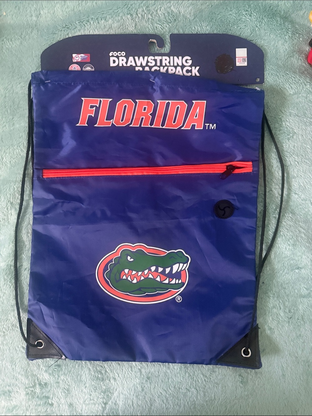 Florida Drawstring Backpack in Blue with Orange Accents